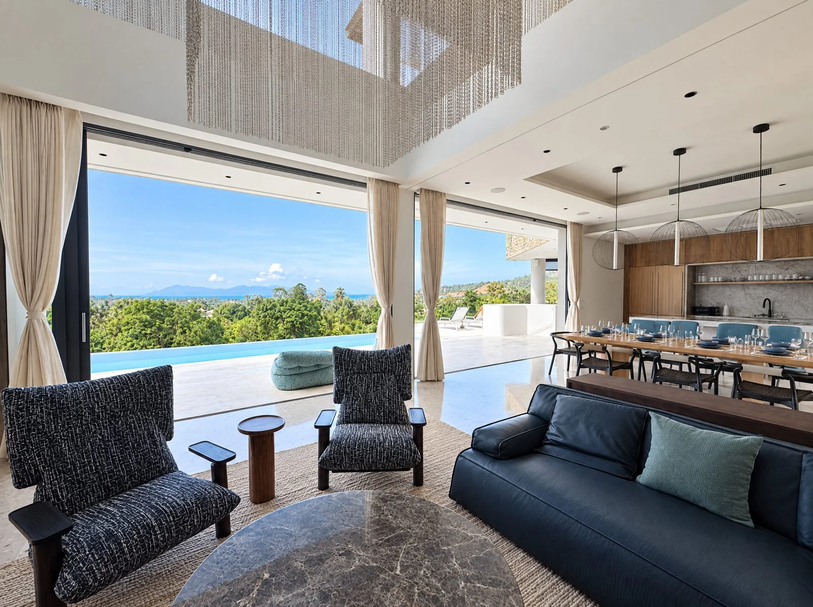 Living room opening to the pool